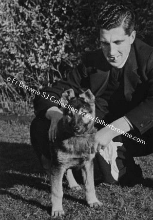 MAN WITH DOG